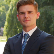 Adam A.