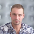 Juliusz E.